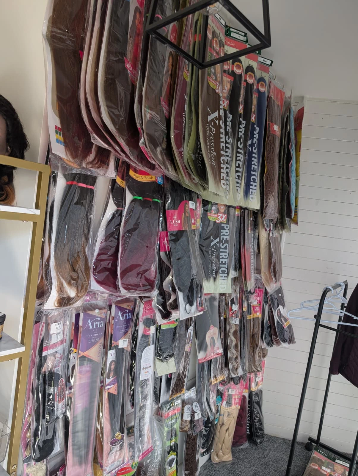 An expansive look inside our Kitchener textured hair salon, designed to provide a premium, relaxing experience for the Afro-Caribbean community.